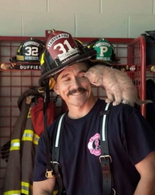 HE PULLED HER OUT OF A BURNING BUILDING—AND THEN SHE NEVER LEFT HIS SHOULDER